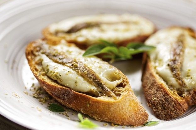 Mozzarella and anchovy crostini