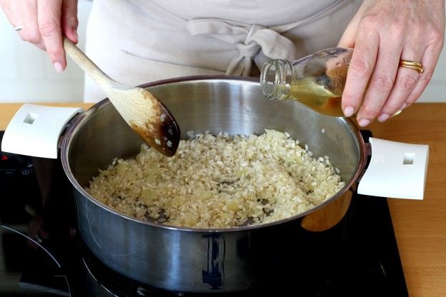 Add the rice, then the white wine