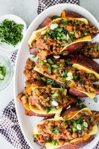 Baked Sweet Potatoes with Cheesy Veggie Chili