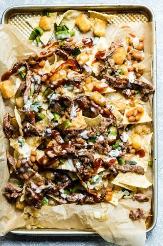 Epic Steak Nachos with Beans and BBQ Sauce