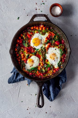 Harissa Baked Eggs with Chickpeas, Spinach and Sumac