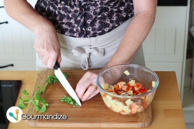 Finely mince the mint, and add it to the salad.