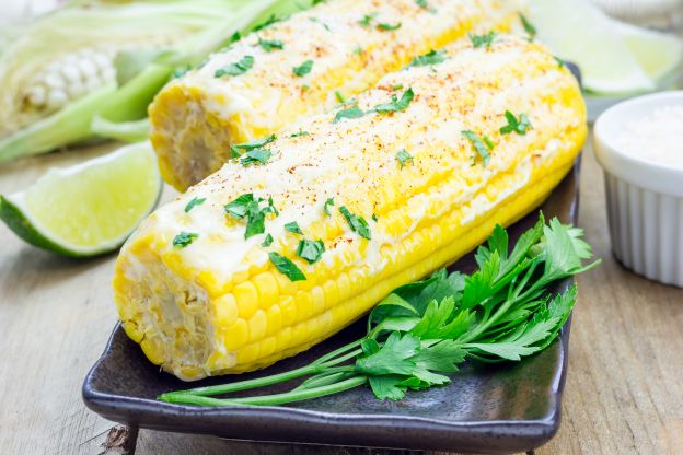 Cheese-dusted corn on the cob