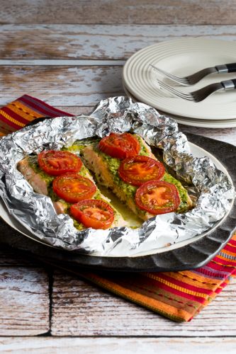 Foil-baked salmon with basil pesto and tomatoes