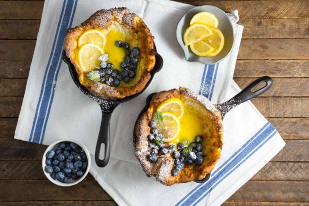 Mini Dutch babies with lemon curd and blueberries