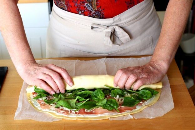 Roll up the sheet of puff pastry as tightly as possible