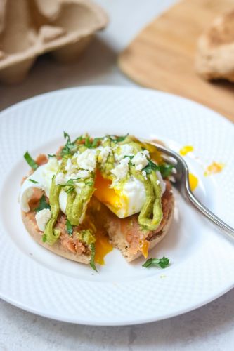 Mexican eggs benedict with avocado hollandaise