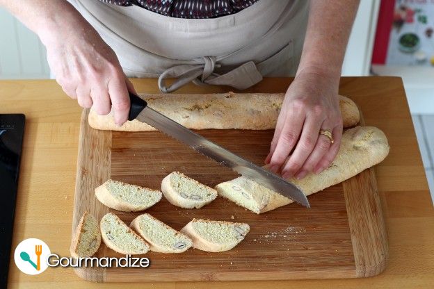 Wait 5 minutes, then slice the warm rolls at an angle into 1.5-cm thick pieces