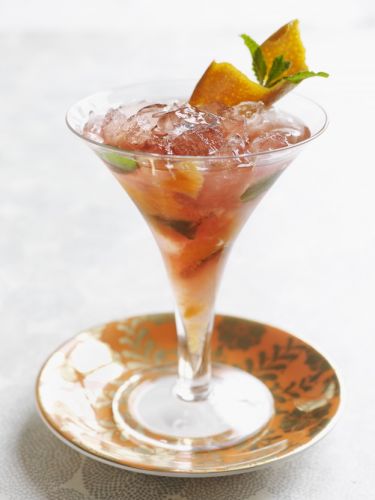 Orange pomegranate mojito