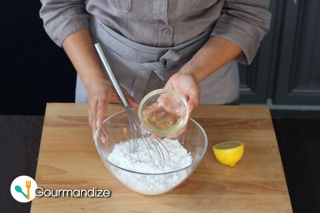 Make the icing: powdered sugar + egg whites