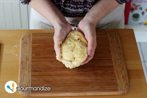 Start mixing with a spoon, then knead by hand just enough to form a ball