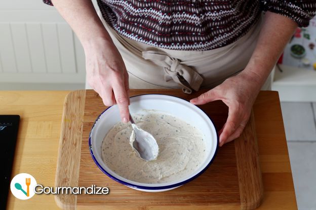 Transfer the cream cheese mixture to an 8 oven-safe bowl, and smooth over the top with a spoon