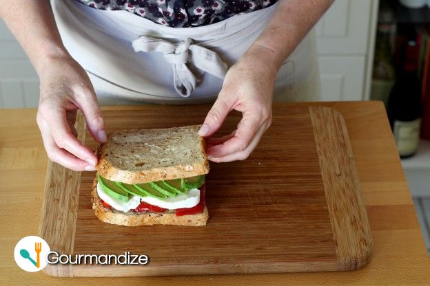 Top with another slice of buttered bread