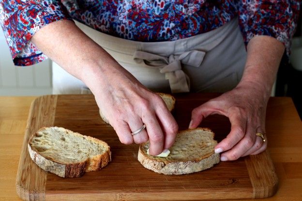 Rub the garlic onto the bread