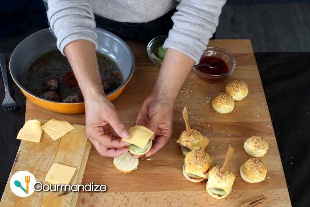 Assemble the burgers: cheese