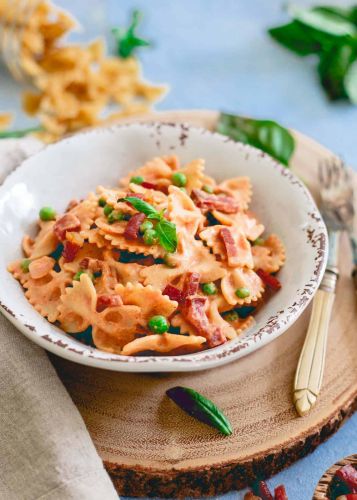 Creamy Tomato Farfalle with Peas and Crispy Prosciutto