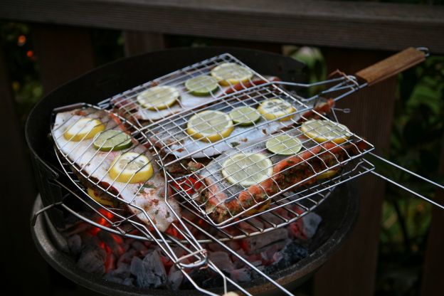 Grill fish on top of lemon slices