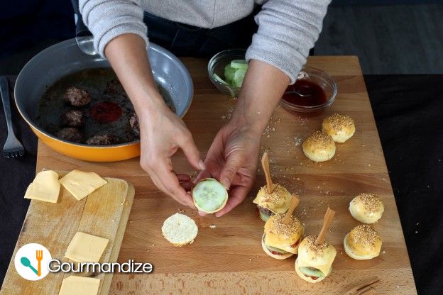 Assemble the burgers: cucumber