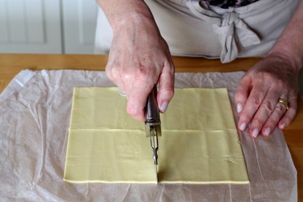 Cut the puff pastry sheet into squares.