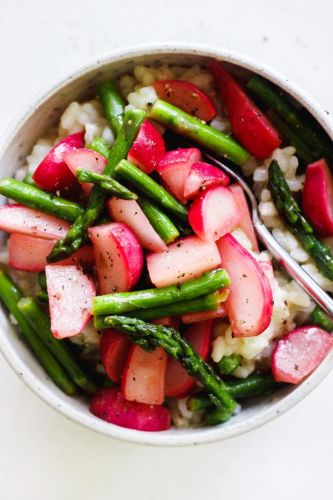 Creamy risotto with sauteed spring vegetables