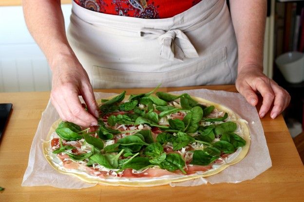 Top with the spinach leaves