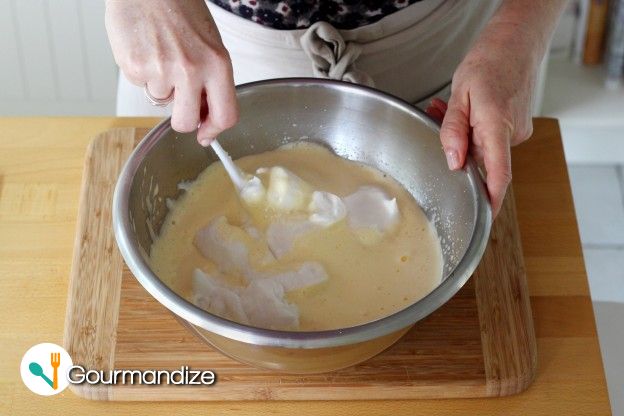 Incorporate the beaten egg whites into the batter using a spatula