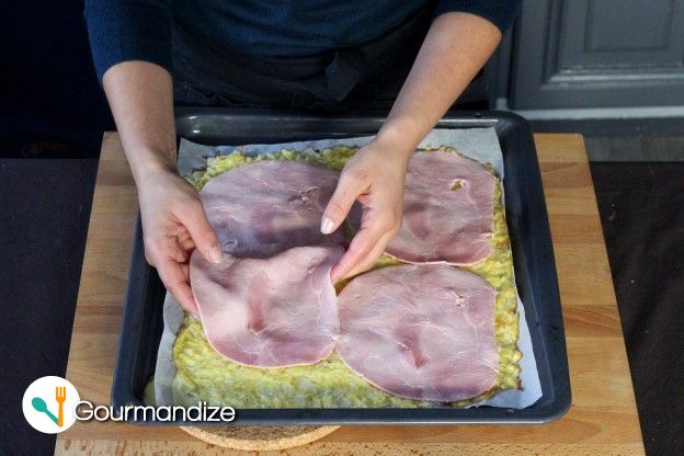 Lay out the slices of ham on top of the potato base