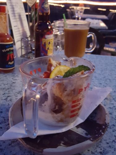 Bread Pudding served in a measuring cup