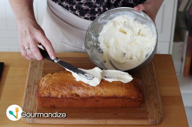 When cooled, spread a generous layer of frosting onto the loaf