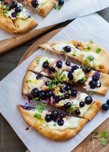 Blueberry, feta and honey caramelized onion naan pizza