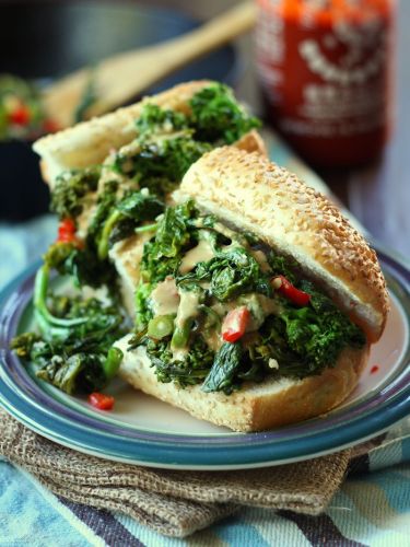 Hot garlicky broccoli rabe sandwich with smoky tahini cheese sauce