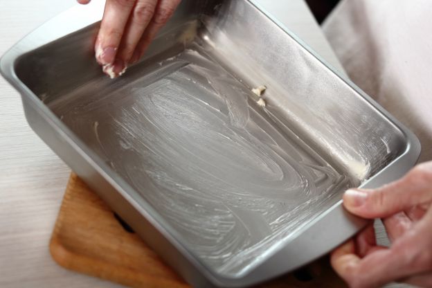 Butter Your Baking Pan or Mold with Softened Butter (Not Melted)