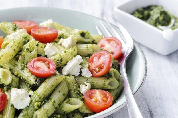 Pesto penne with cherry tomatoes and feta