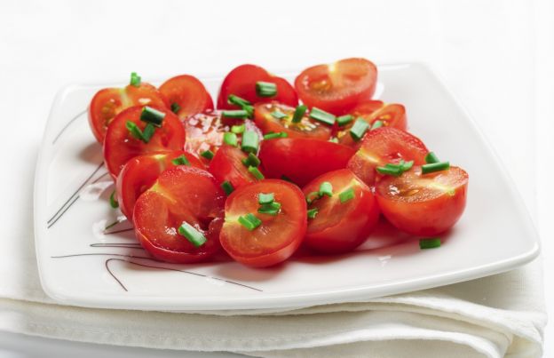 Slice cherry tomatoes in one go