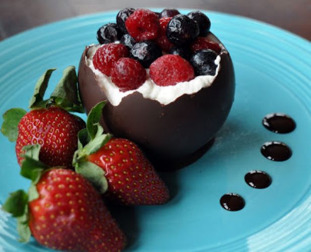 Chocolate bowls with Chambord whipped cream and berries