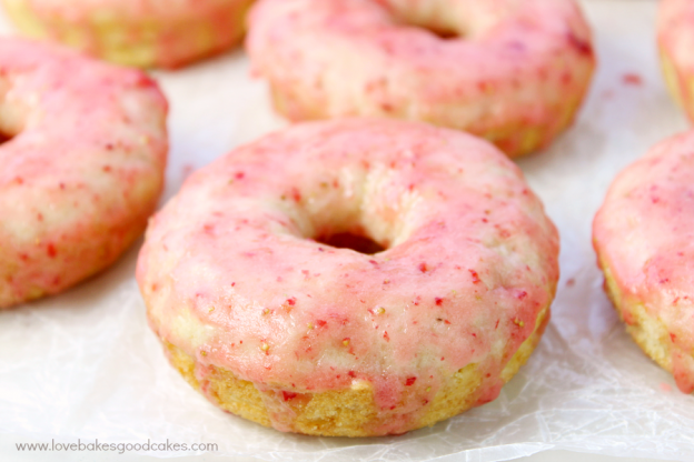 vanilla cakes donuts with strawberry glaze