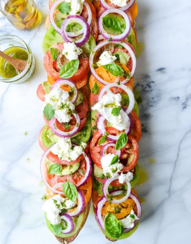 Heirloom Tomato Avocado and Burrata Salad on Grilled Garlic Toast