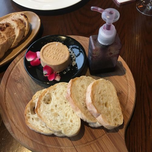 Berry sauce served in a hand wash dispenser