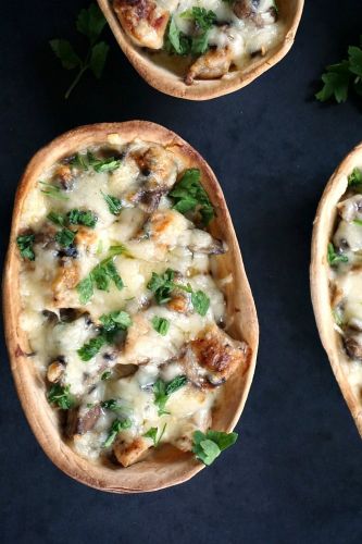 Easy cheesy taco boats with chicken and mushrooms