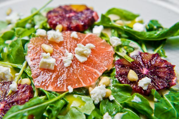 Fresh salad with citrus fruits