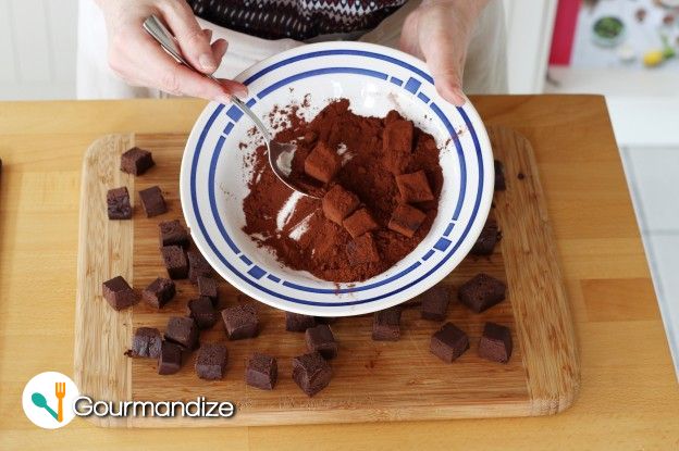 Coat 1/3 of the cubes in the cocoa powder