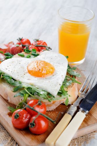 Heart-shaped egg breakfast