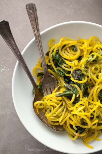 Golden beet noodles with beet greens and cilantro tahini sauce