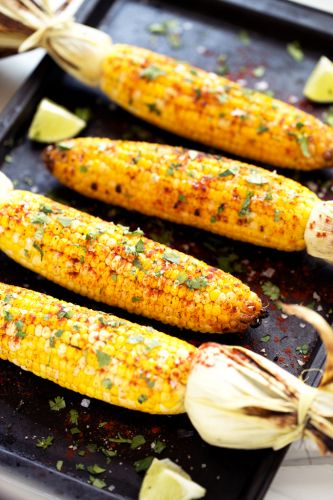 Grilled cilantro, lime and paprika corn on the cob