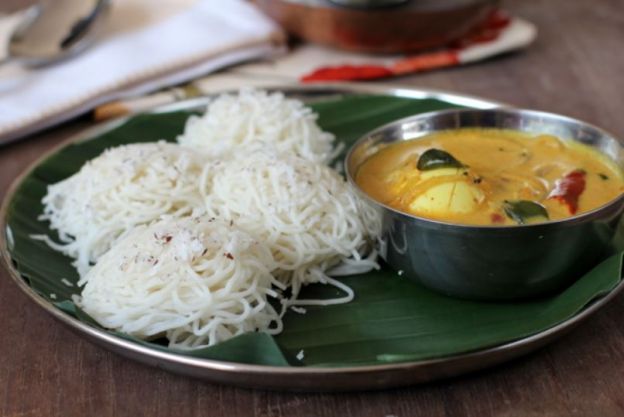 Idiyappam with egg curry (India)