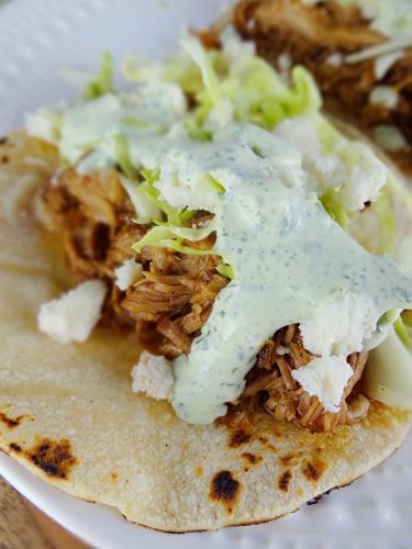 IRISH TACOS with GUINNESS BRAISED PORK + GREEN CREMA