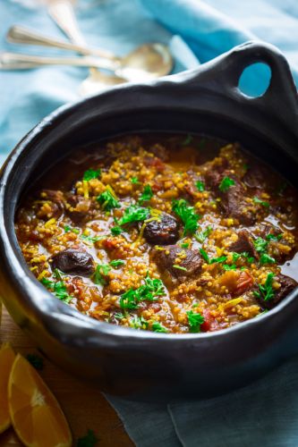 Millet and lamb tagine with prunes and cinnamon