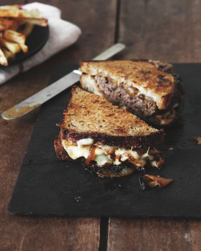 Patty melt with beer, caramelized onions and Cooper sharp cheese