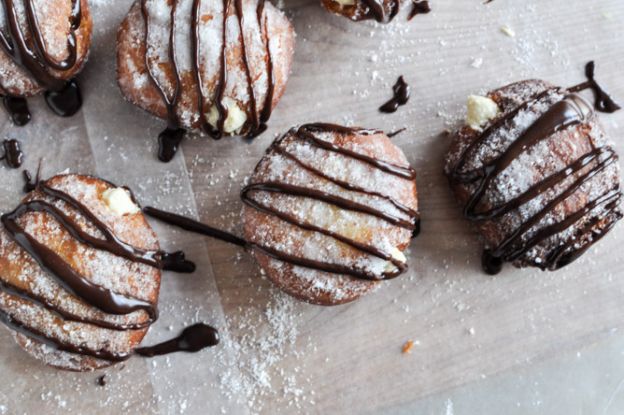 Peanut butter cream filled donuts with chocolate drizzle