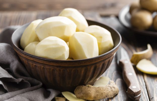 Boil, then peel your potatoes